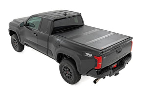 Rough Country Hard Tri-Fold Flip Up Bed Cover for 2024-2026 Toyota Tacoma
